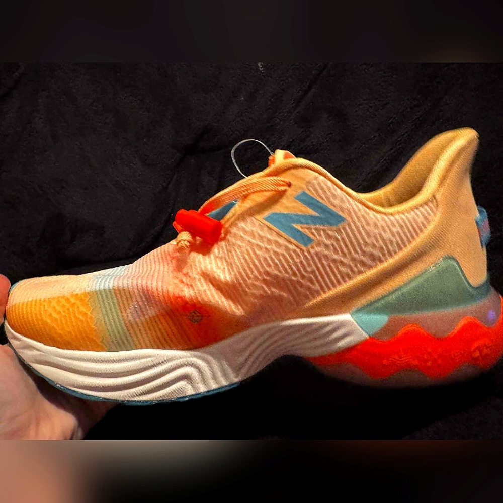 New Balance womens Fuelcell Rebel Tr V1 Solar Flare/White